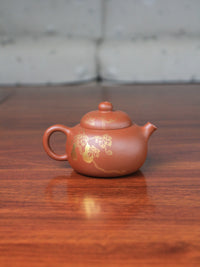Back of the zhuni teapot from zisha art gallery on the table