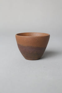 a beautiful zisha teacup is on the table