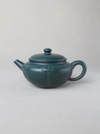 collectible zisha teapot on the table