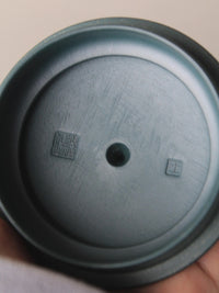 the detail of the teapot lid