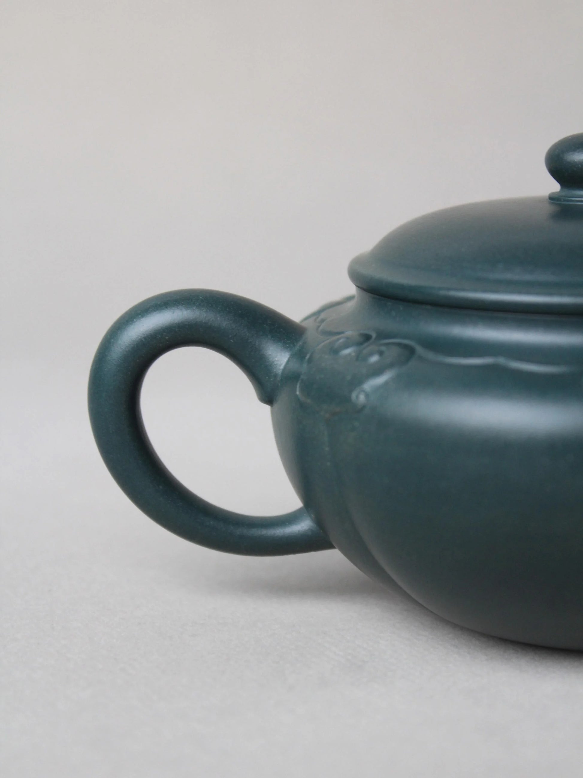 the handle of the collectible zisha teapot