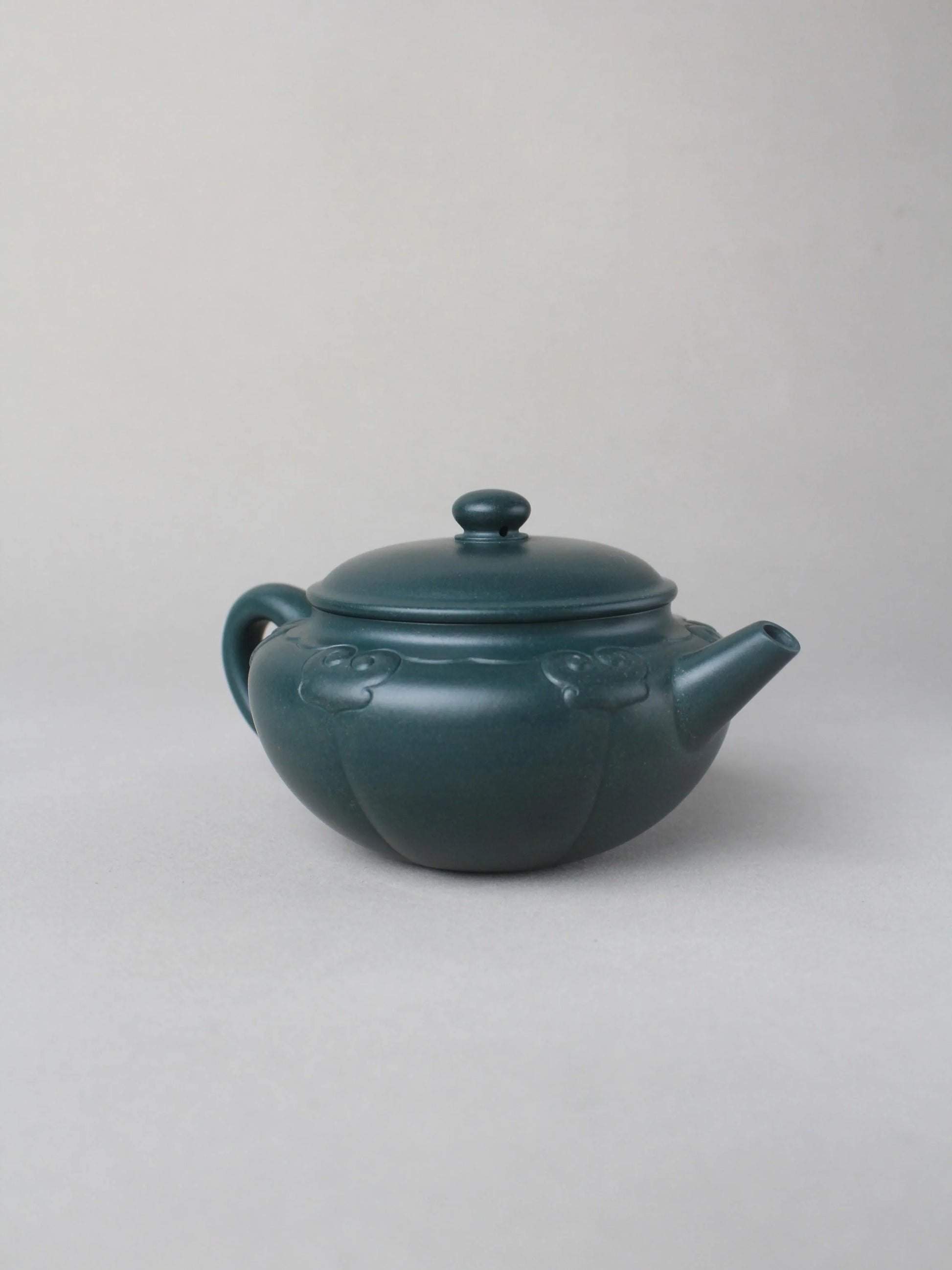 collectible zisha teapot on the table left view