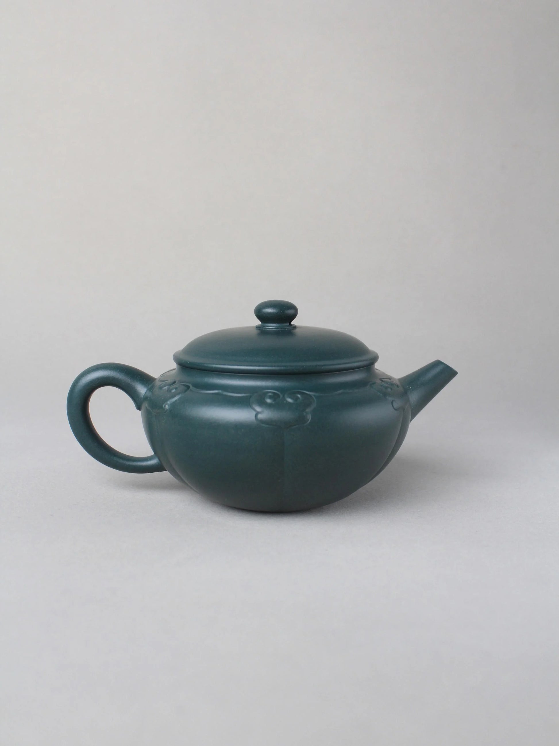 collectible zisha teapot on the table back view