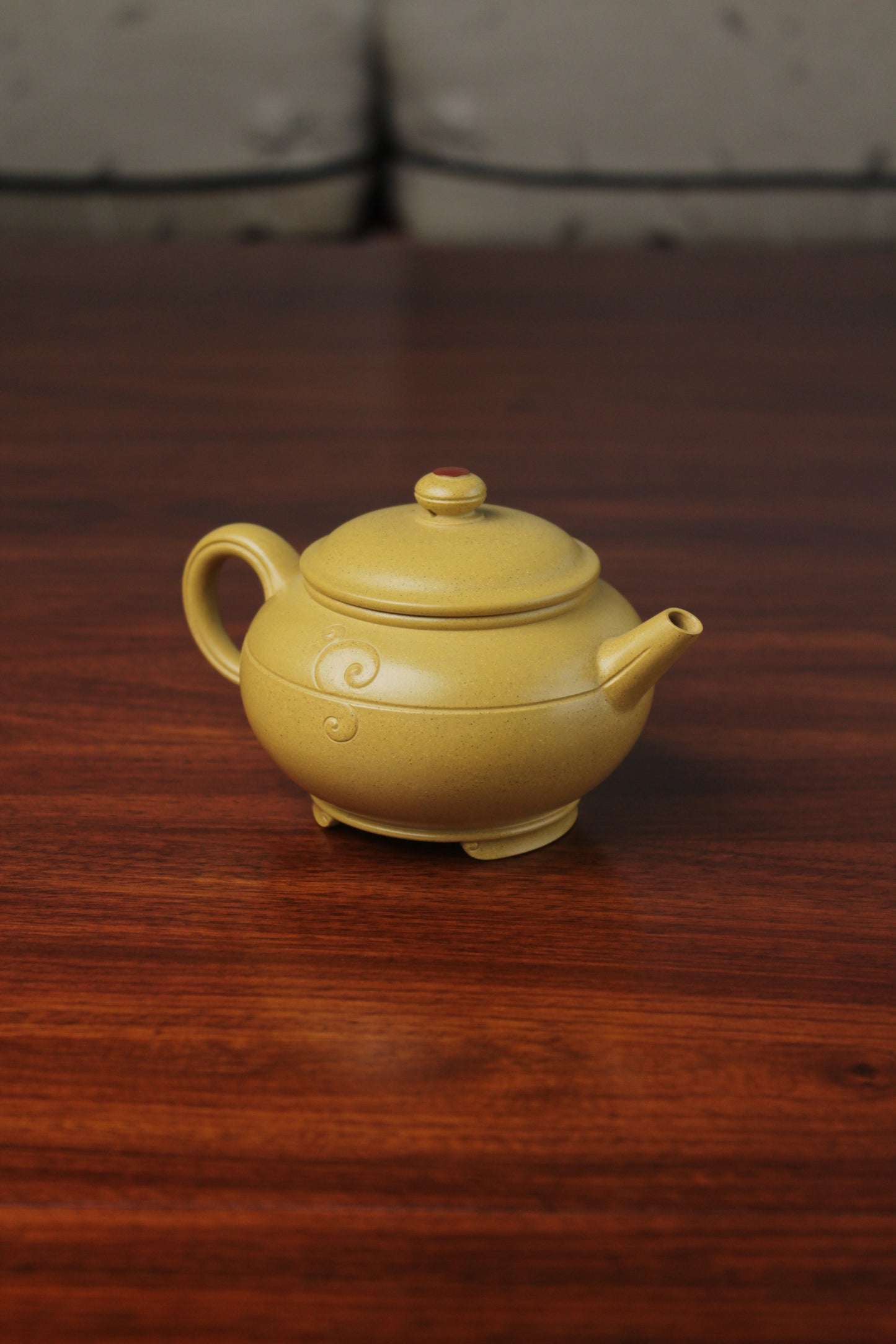 the right of zisha teapot on the table, handmade with purple clay from teapot art zisha art gallery 