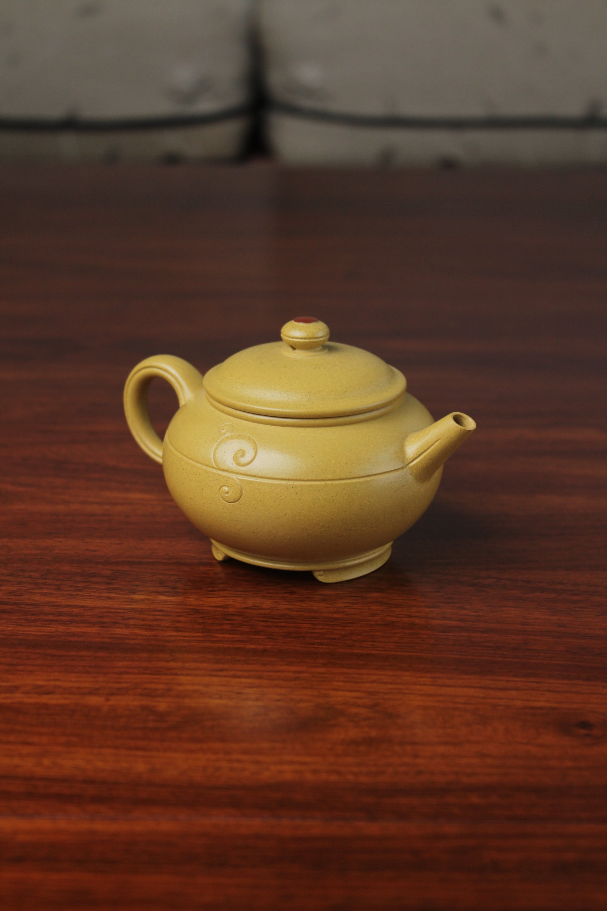 the right of zisha teapot on the table, handmade with purple clay from teapot art zisha art gallery 