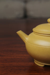 the spout of zisha teapot on the table, handmade with purple clay from teapot art zisha art gallery 