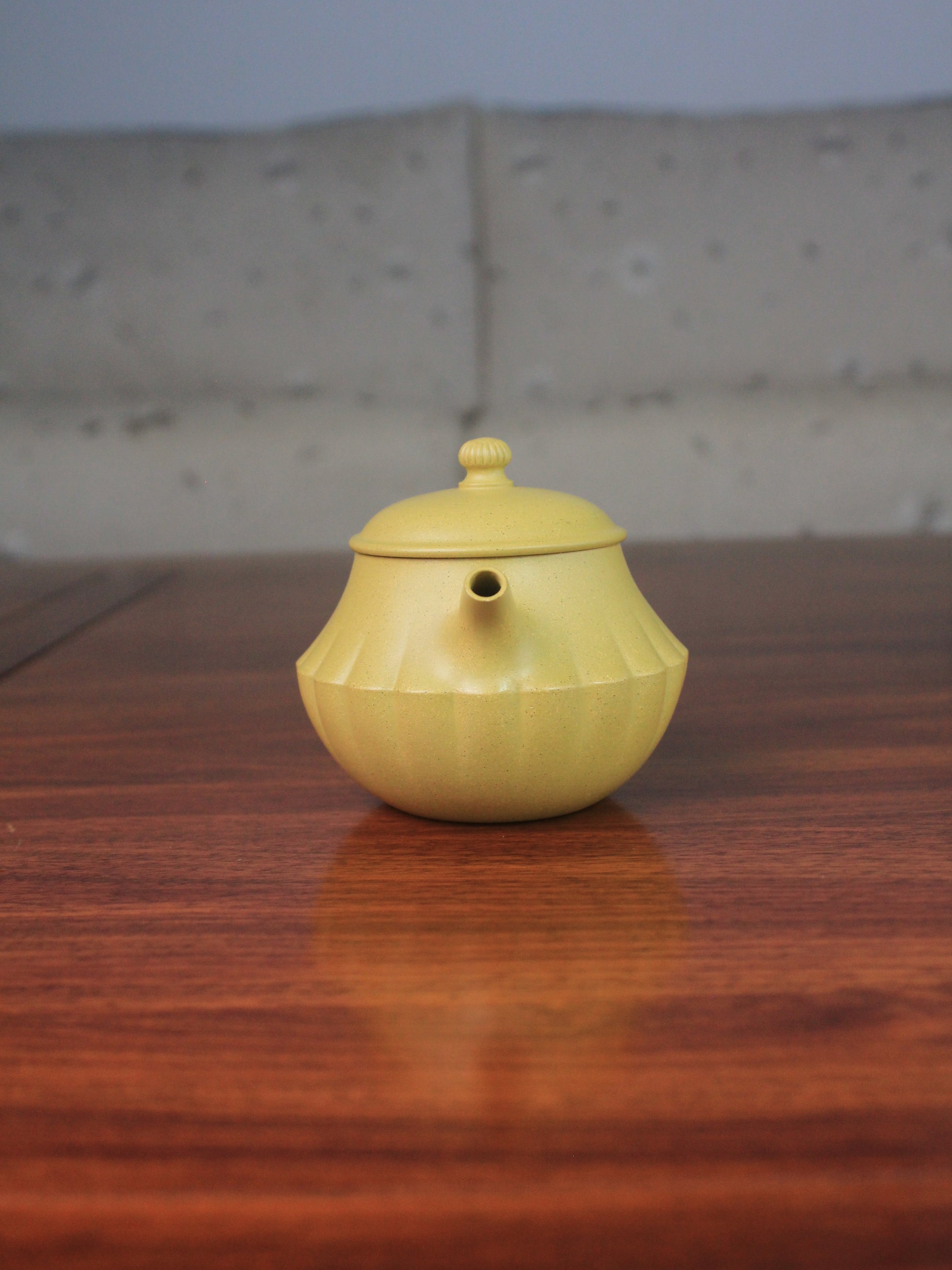 Front of zisha teapot on the table