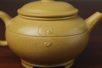 the front detail of zisha teapot, handmade with purple clay from teapot art zisha art gallery 