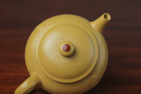 the konb of zisha teapot, handmade with purple clay from teapot art zisha art gallery 