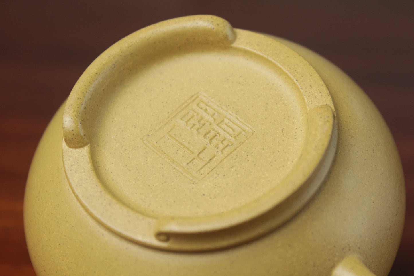 the mark detail of zisha teapot, handmade with purple clay from teapot art zisha art gallery 