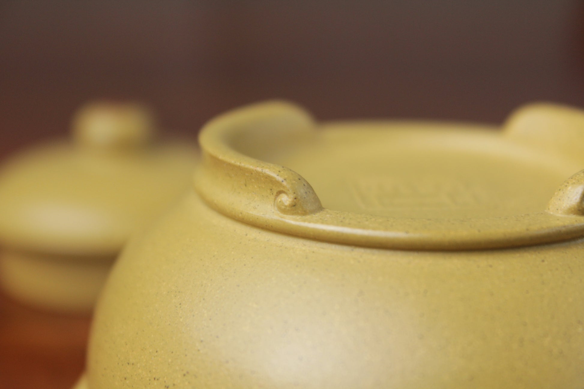the bottom detail of zisha teapot, handmade with purple clay from teapot art zisha art gallery 