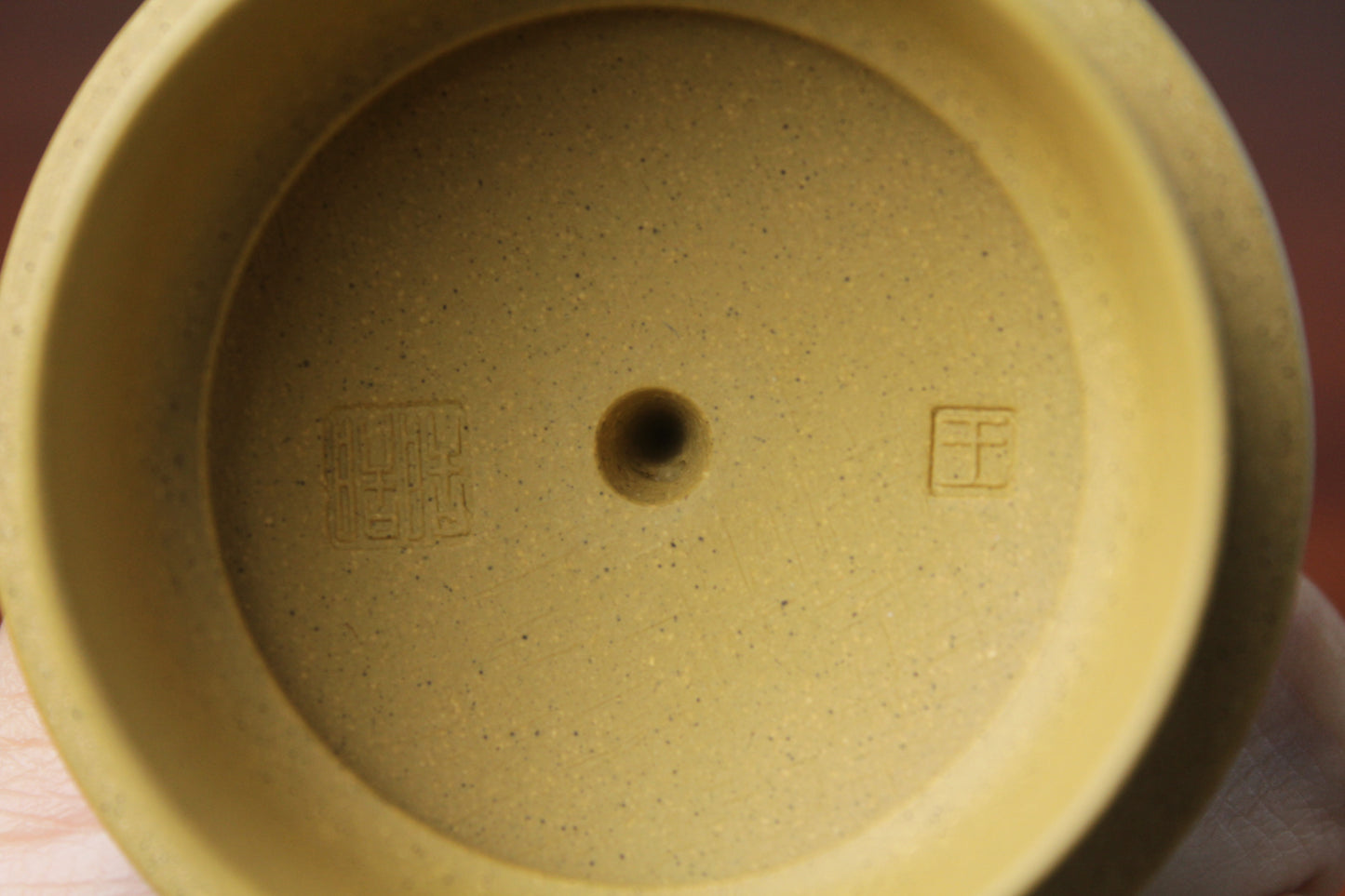 the lid mark detail of zisha teapot, handmade with purple clay from teapot art zisha art gallery 
