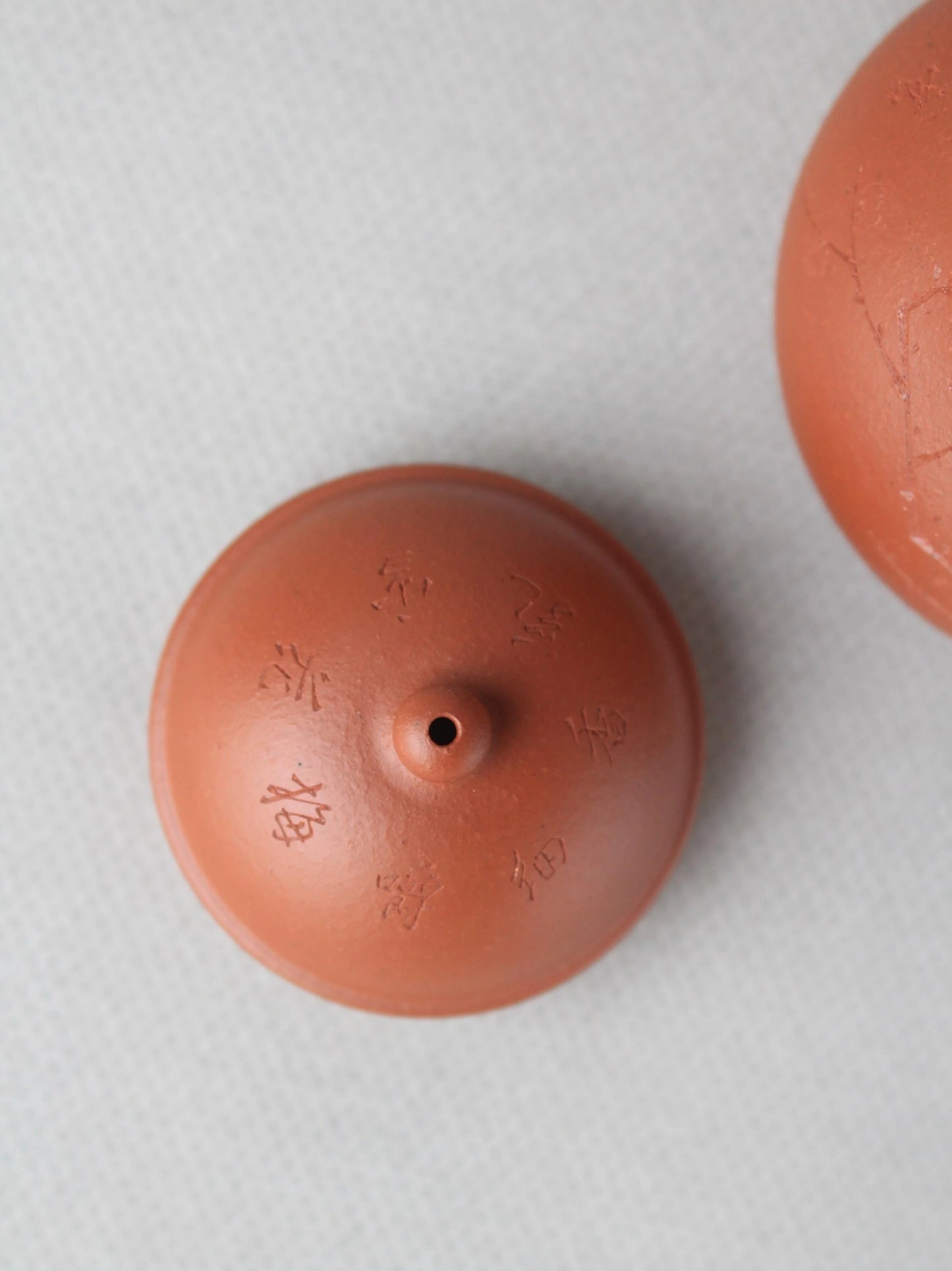 the lid of the small zisha teapot