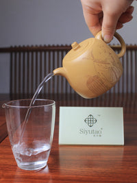 the perfect pour of zisha teapot named Han Duo