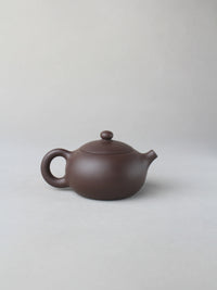the back view of the yixing zisha xishi teapot
