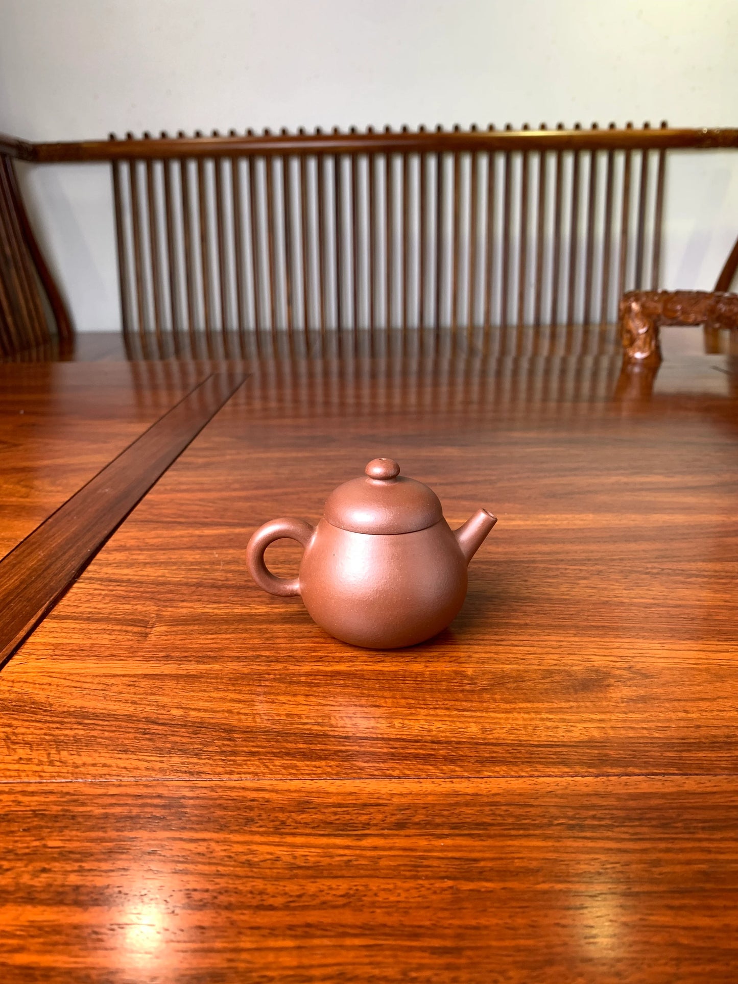 the back view of the zisha teapot named wen dan