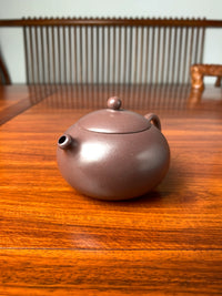 the right view of the zisha teapot named xishi