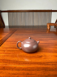 the back view of the zisha teapot xishi