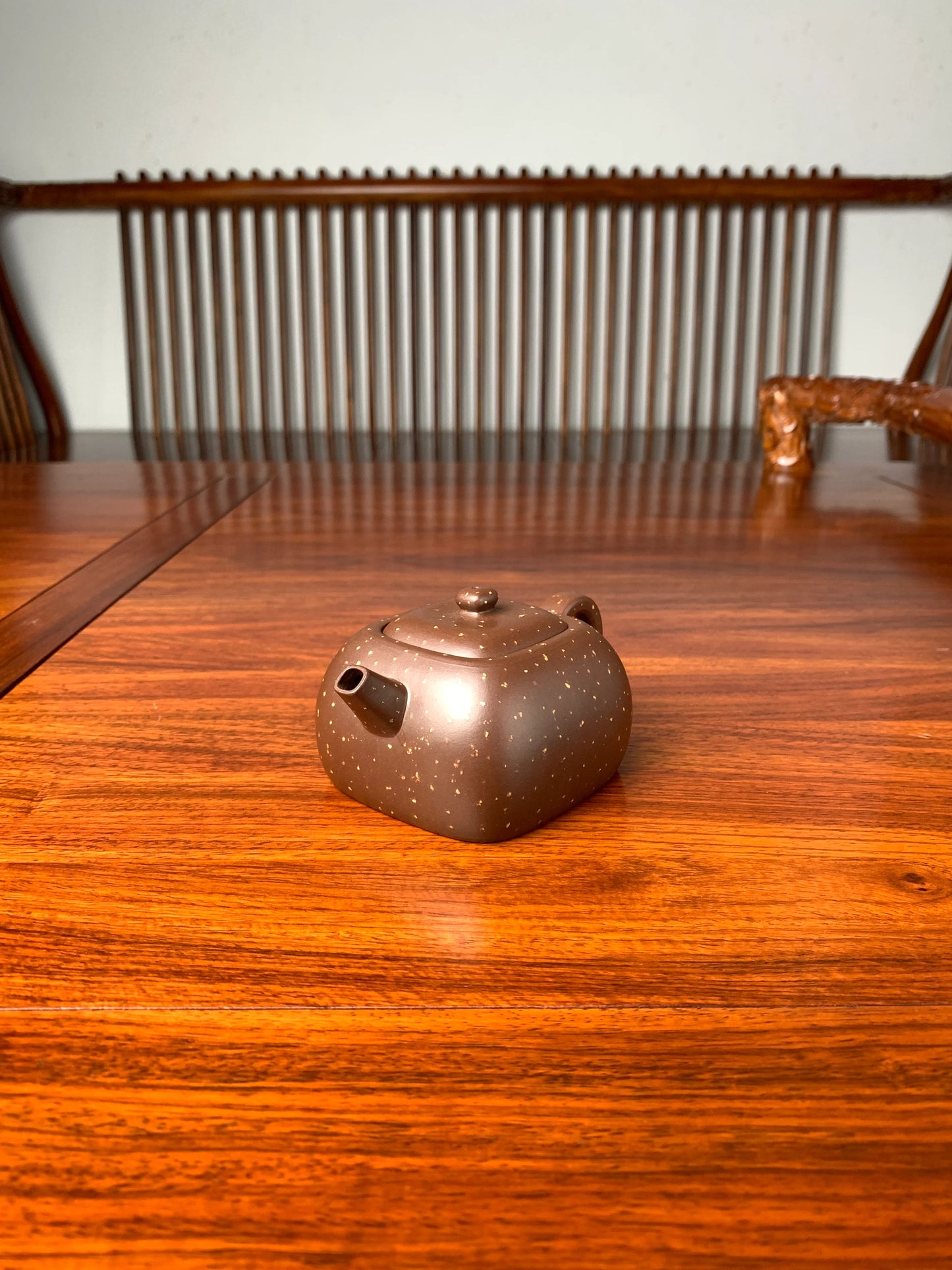 the right view of the zisha teapot on the table
