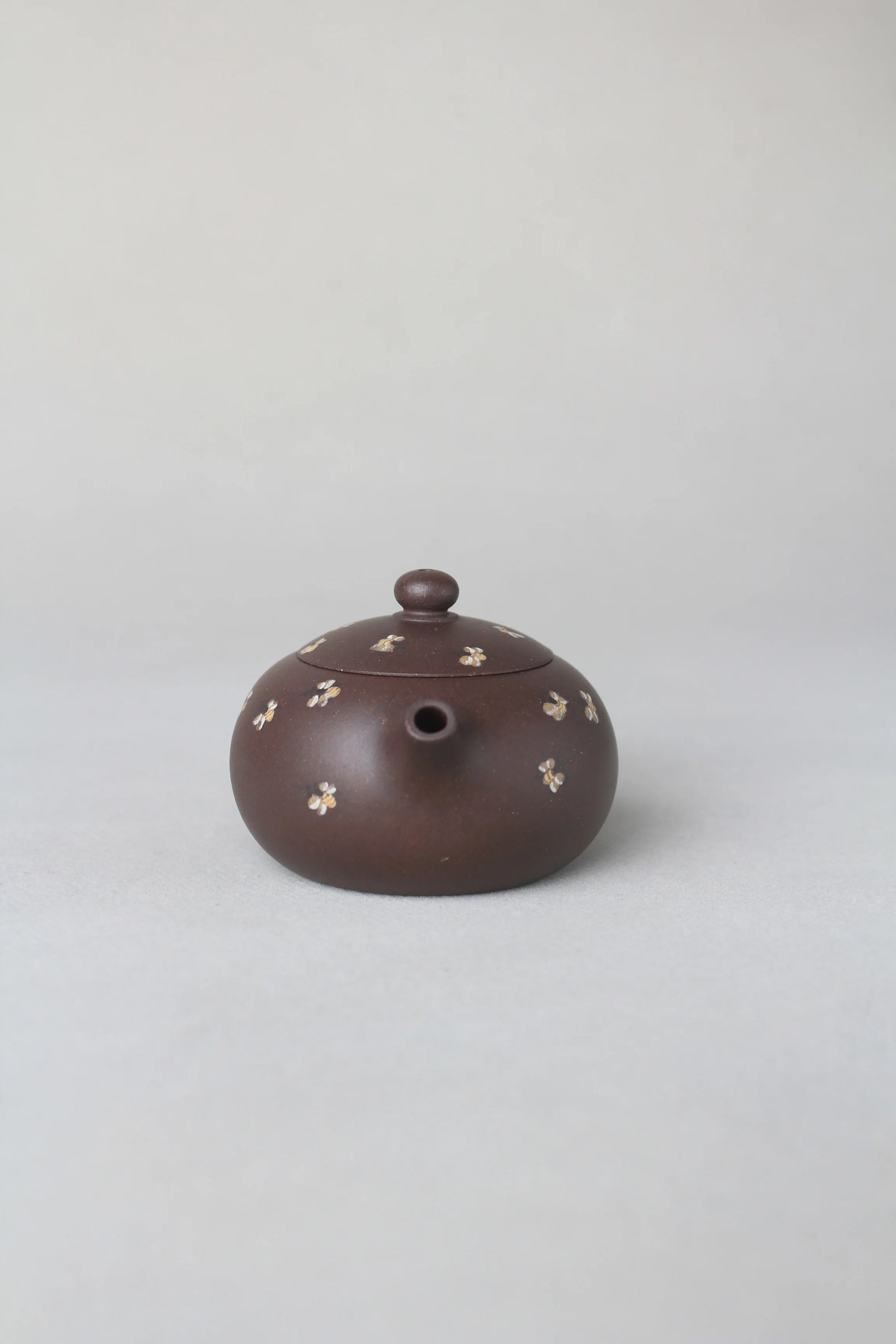 front view of small zisha teapot named xishi
