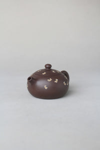 right view of small zisha teapot named xishi