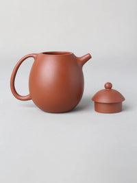 the details of the dragon egg zisha teapot with cat painting