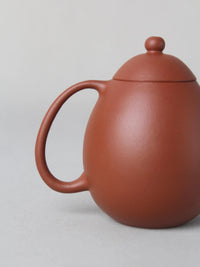 the handle of the dragon egg zisha teapot